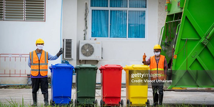 Thueia staff in recycling facility