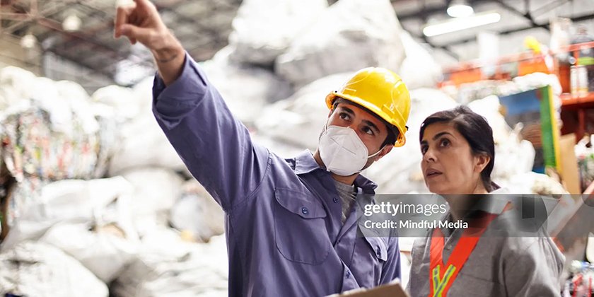 Thueia staff in recycling facility