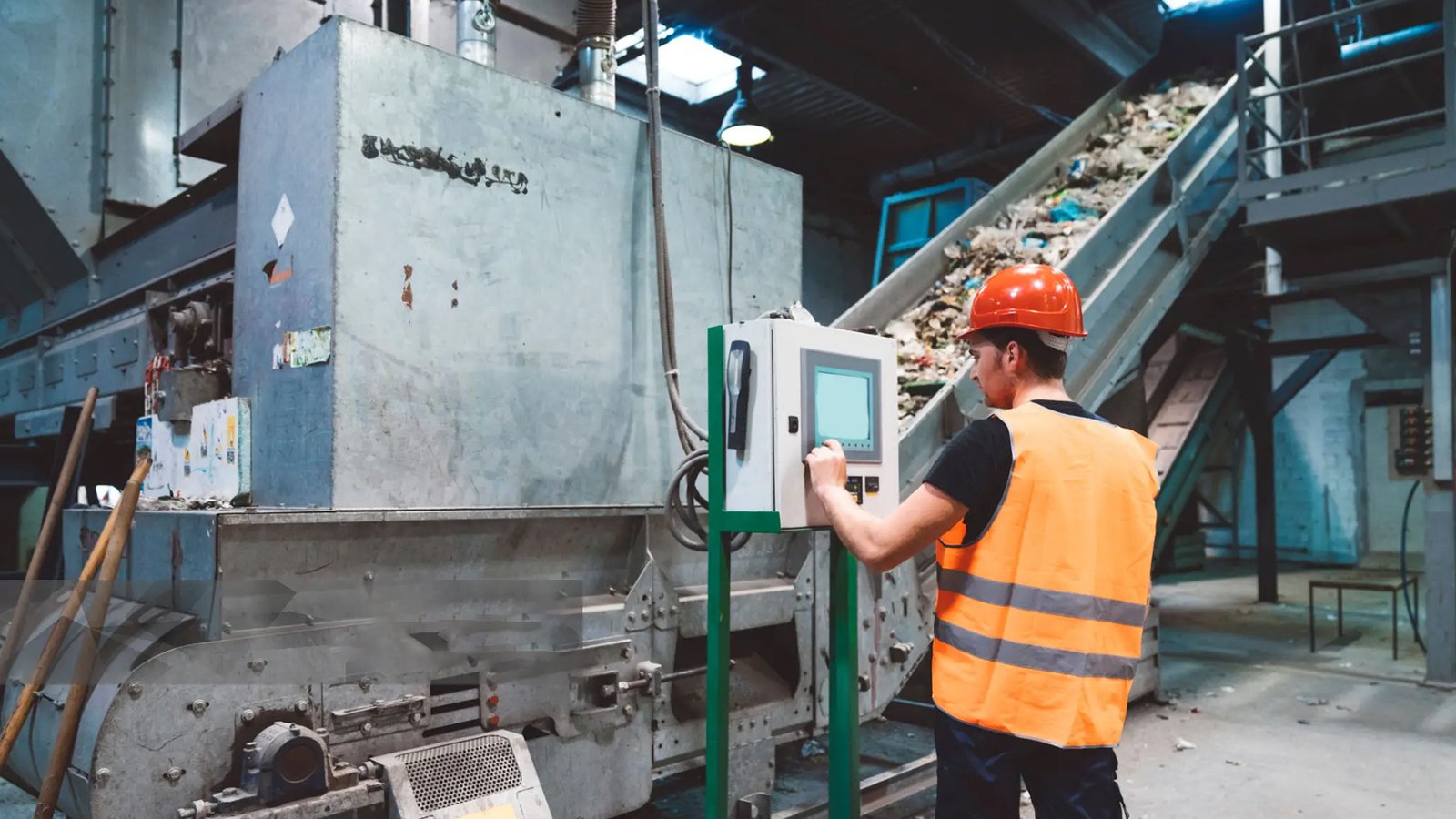 Thueia employee standing next to forklift